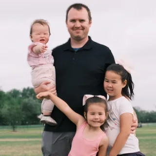 Casey with his daughters